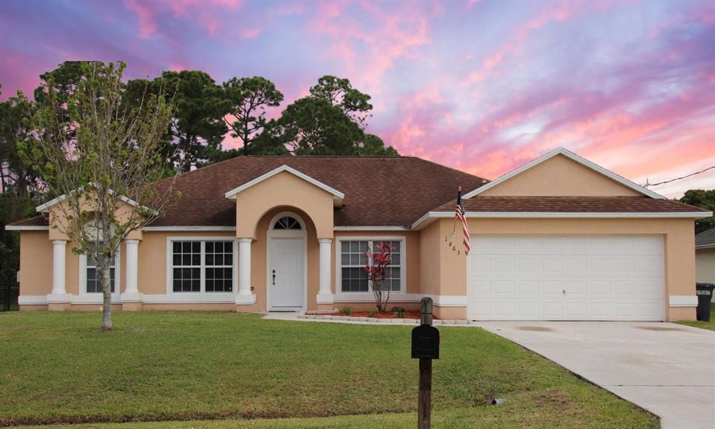 Photo of 1863 SW Bellevue Avenue, Port Saint Lucie, FL 34953 (MLS # R10696696)