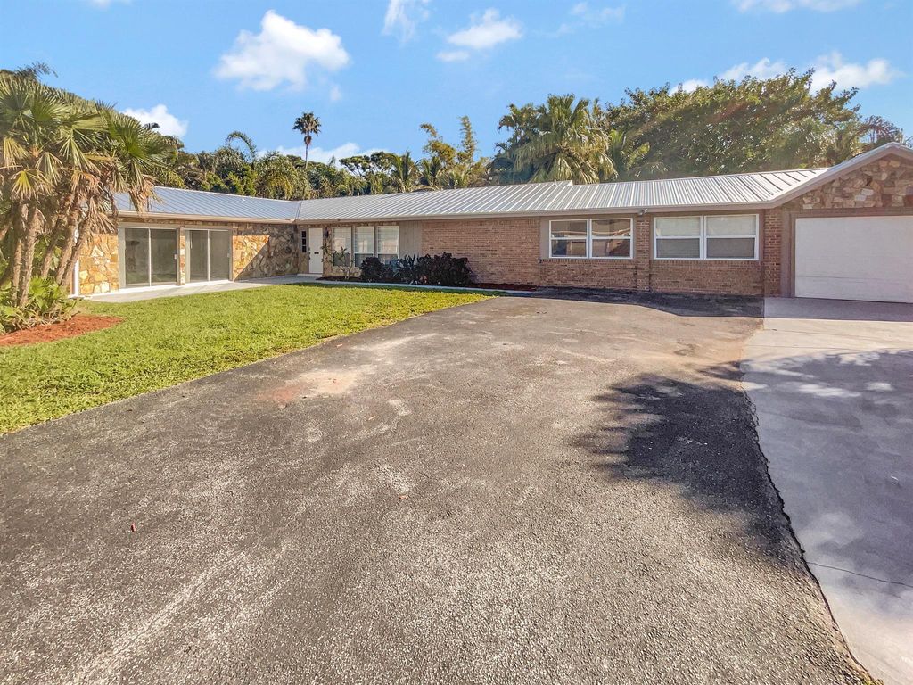 Photo of 2113 SE Harlow Street, Port St Lucie, FL 34952 (MLS # R10841715)