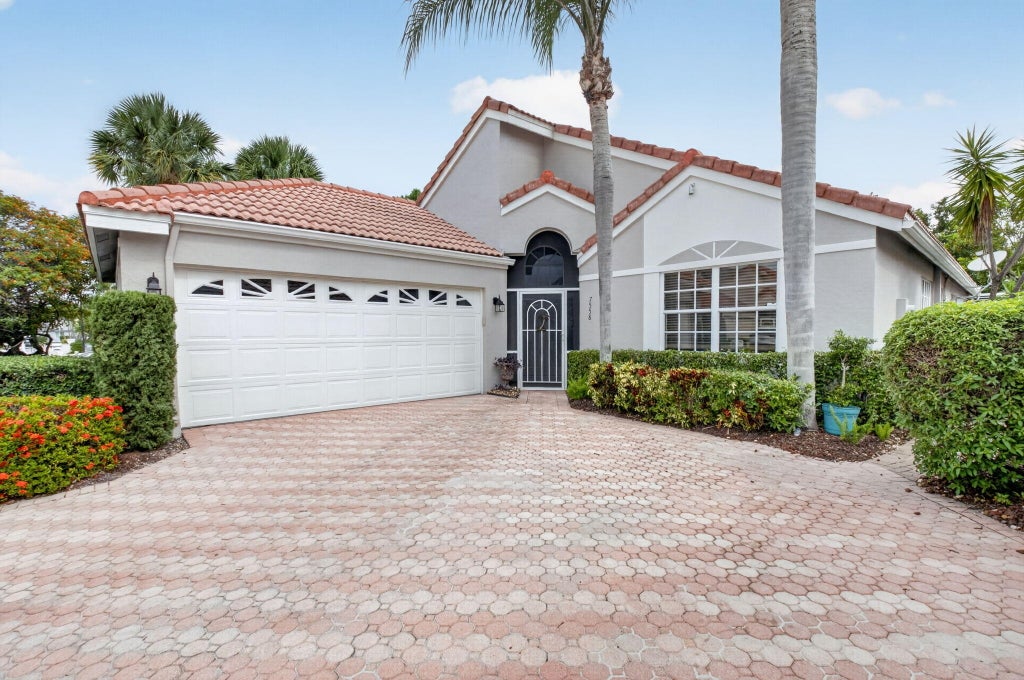 Photo of 7558 Ironbridge Circle, Delray Beach, FL 33446 (MLS # B26029644)