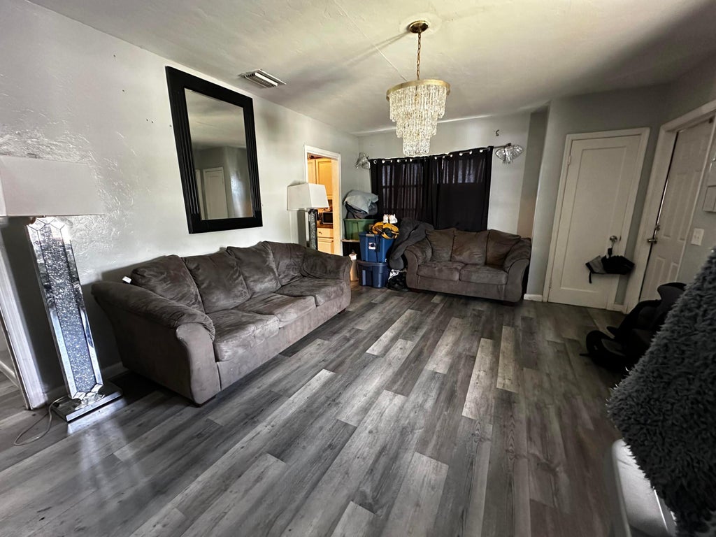 Photo of 566 SE 7th Drive, Belle Glade, FL 33430 (MLS # B26041497)