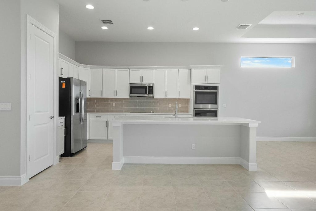 Photo of 12398 SW Sunrise Lake Terrace, Port Saint Lucie, FL 34987 (MLS # R11051842)
