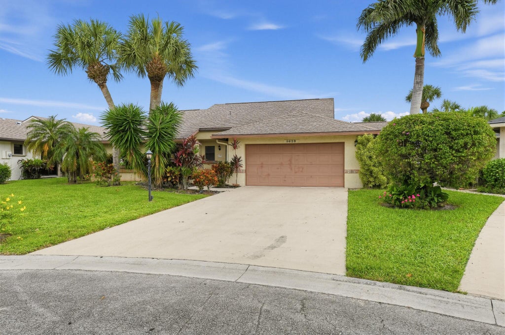 Photo of 5628 Pleasant Valley Lane, Delray Beach, FL 33484 (MLS # B26083101)
