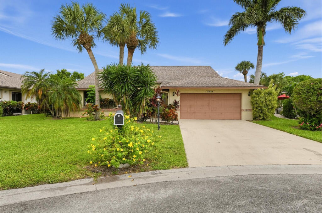 Photo of 5628 Pleasant Valley Lane, Delray Beach, FL 33484 (MLS # B26083101)