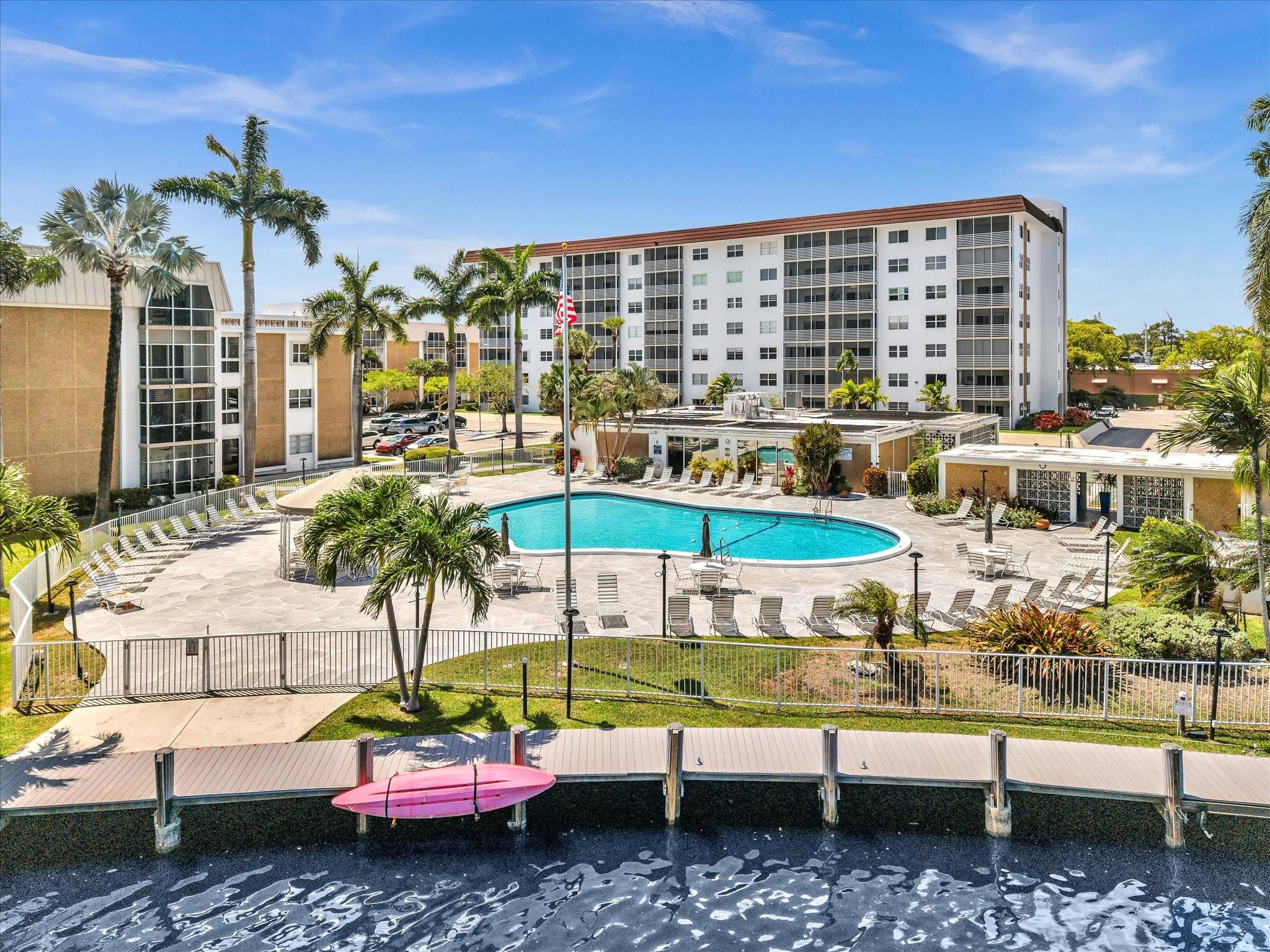 Welcome to this comfortable 2-bedroom, 1-bath condo offering 850 sq ft of living space located in a serene, gated community right on the Middle River. Step inside to find a modern kitchen and bathroom, both tastefully renovated. The spacious living area flows seamlessly to a screened balcony where you can unwind and enjoy calming river breezes. This pet-friendly community offers resort-style amenities, including a sparkling pool with stunning river views, newly updated laundry facilities with brand-new washers and dryers, tennis, billiards, asigned parking spot and ample guest parking. Cable TV and internet included. Located close to Wilton Drive, the beaches, restaurants, shopping and much more. Schedule your showing today!!