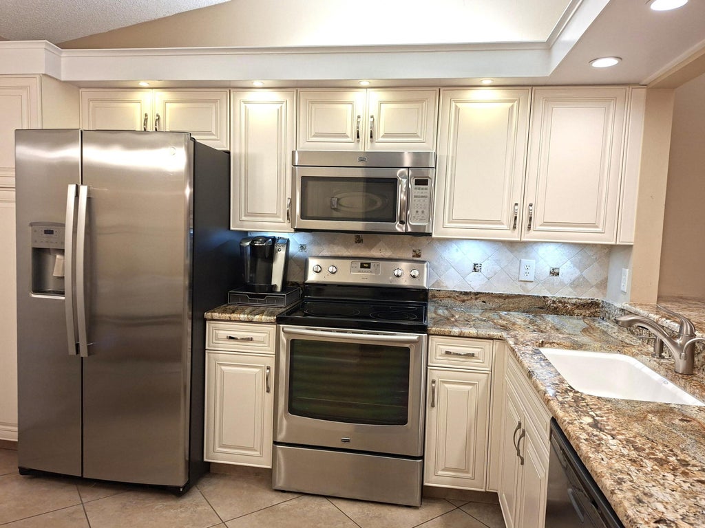 Photo of 5790 Kayla Drive #43B, Boynton Beach, FL 33437 (MLS # B26092429)
