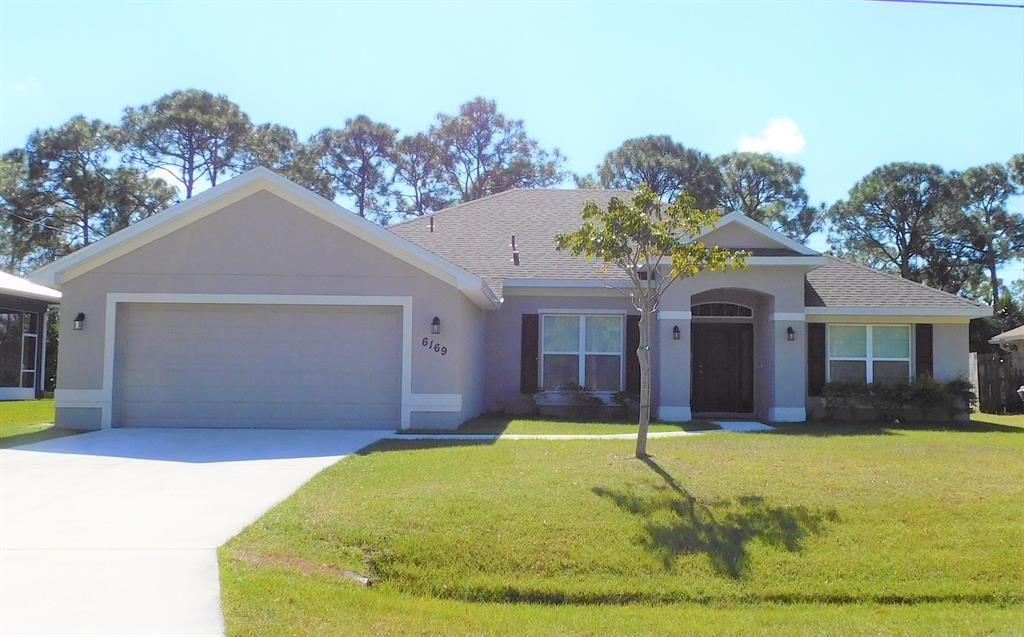Photo of 6169 NW E Deville Circle, Port Saint Lucie, FL 34986 (MLS # R10690601)
