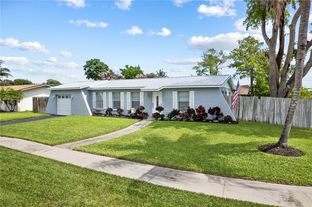 Bring your toothbrush! Gorgeous upgraded single-family home, on a corner lot. Turnkey move-in ready condition with NEW ROOF (standing seam aluminum) - 3 bedroom 2 bath with an amazing fenced-in backyard. Open and modern floor plan. New hurricane-rated garage doors - No HOA or rental restrictions. Conveniently located next to major highways, restaurants, shopping, and 10 miles from the beach!