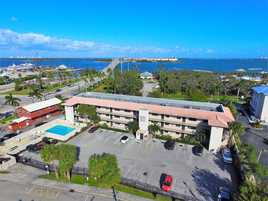 Corner Unit Condo with Beautiful Park & Intracoastal view. Walk to Downtown Fort Pierce to enjoy Parks, Shopping, Banking, the Sunrise Theater and many Great Restaurants. Cross street to fishing pier or over bridge to Beaches. Complete with Shutters.Updated Kitchen and bathroom. Great investment in up and coming Historical neighborhood.