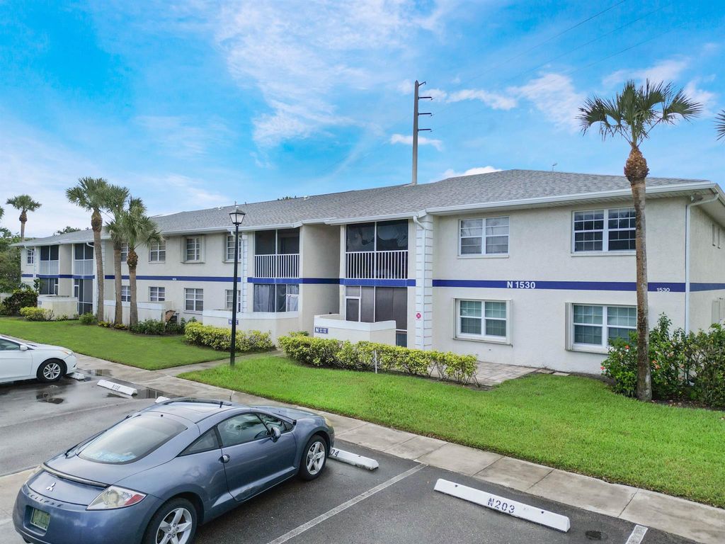 Photo of 1530 SE Royal Green 108 Circle #108, Port Saint Lucie, FL 34952 (MLS # R11102039)