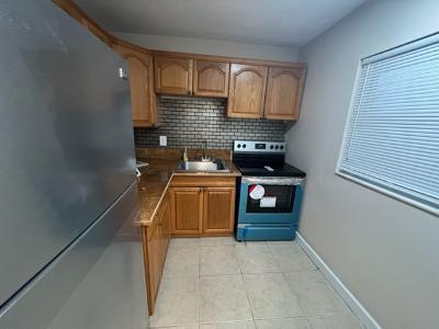 Updated top floor condo with brand newer AC, water heater, new fridge, new oven. New Vinyl wood thru out. Freshly painted walls and grass turf on patio. Lots of closet space and walk-in closet in bedroom. 55+ community. 10 minutes to the beach and close to shopping. Clubhouse and pool area next to building