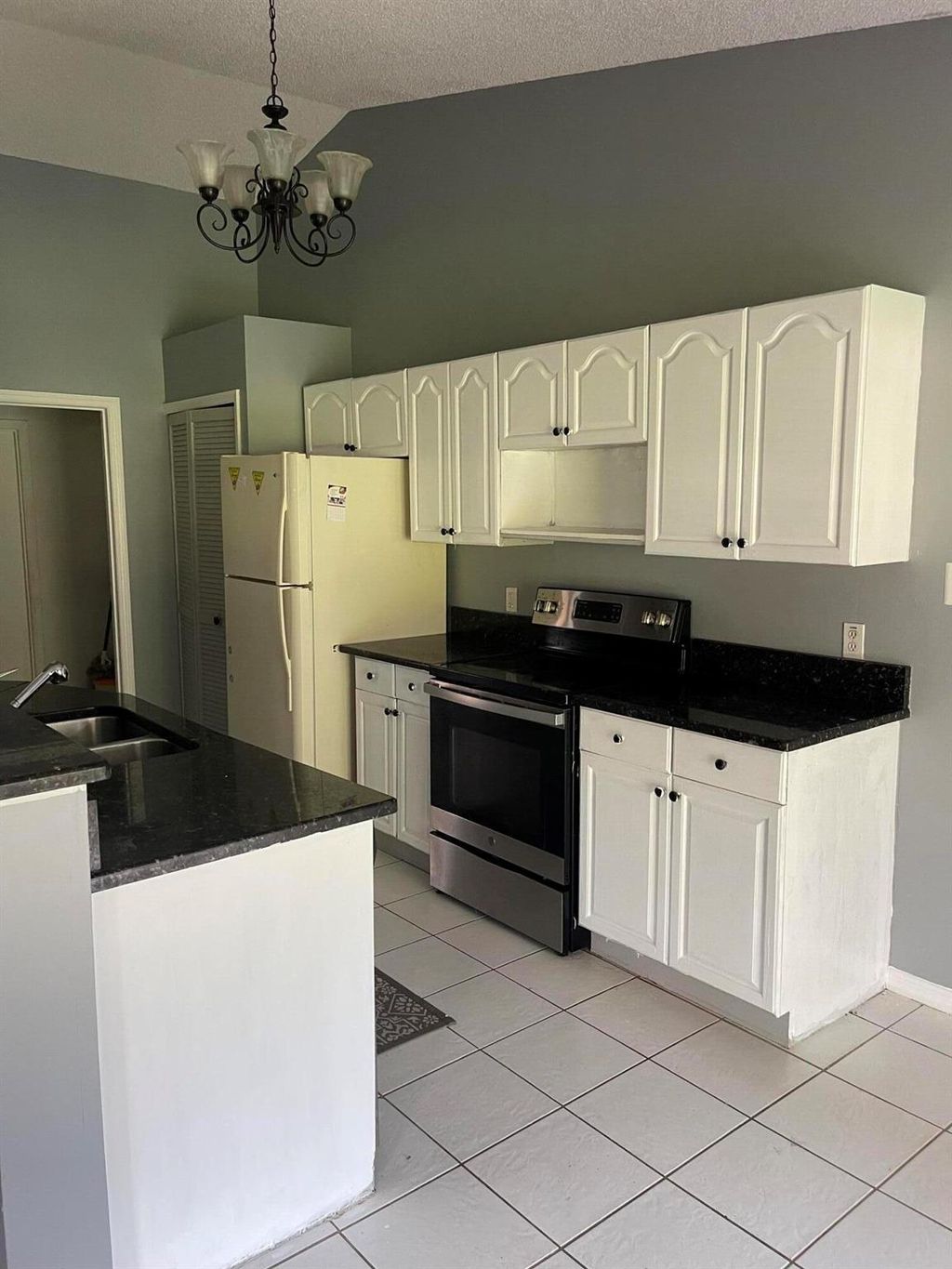 Photo of 1372 SW Sudder Avenue, Port Saint Lucie, FL 34953 (MLS # R10970132)