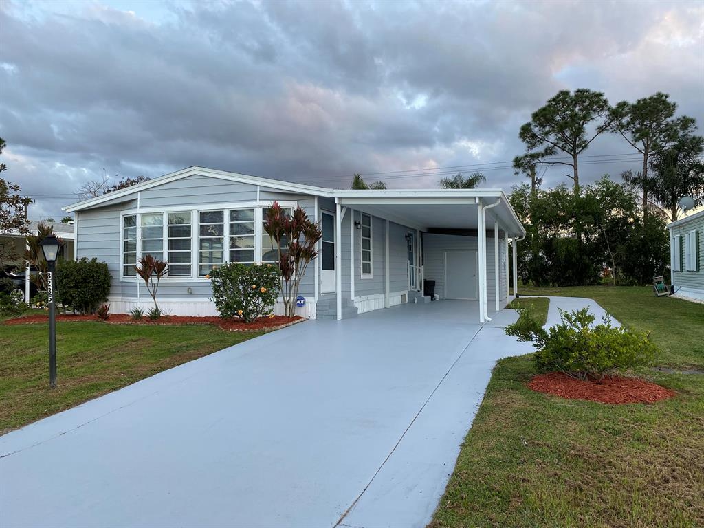 Photo of 8235 Cinnamon Lane, Port Saint Lucie, FL 34952 (MLS # R10766522)