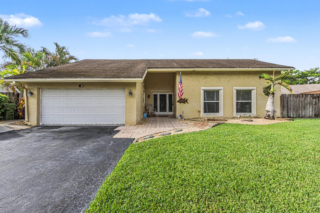 Photo of 10150 NW 22ND Court, Pembroke Pines, FL 33026 (MLS # B26083667)