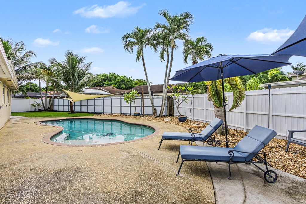 Photo of 10150 NW 22ND Court, Pembroke Pines, FL 33026 (MLS # B26083667)