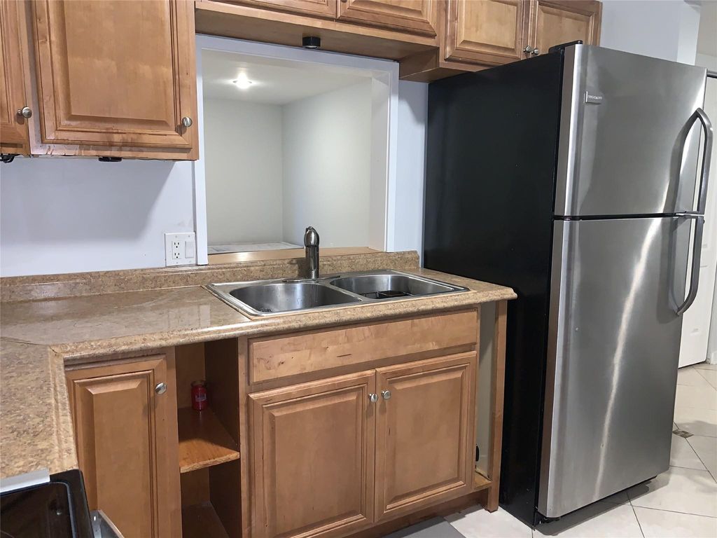 Photo of 8851 N New River Canal Road #1E, Plantation, FL 33324 (MLS # F10535818)