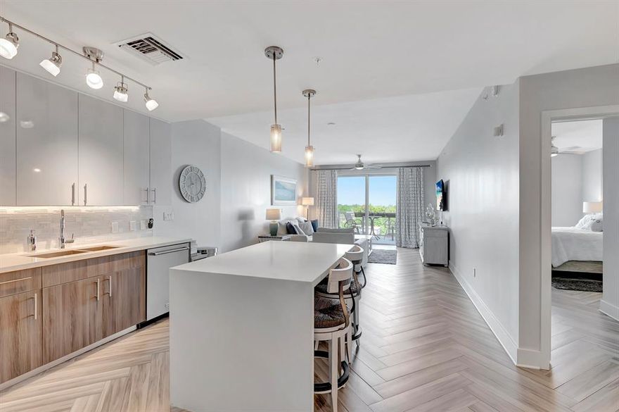 Welcome to this stunning, rarely available penthouse unit in Delray's newest luxury condo building, 236 Fifth. This 1 bedroom, 1 bathroom condominium boasts a large 261 sq. foot balcony with views of downtown Delray. Enjoy an open floorplan featuring a waterfall kitchen island, KitchenAid appliances, and stunning modern finishes. 236 Fifth Avenue is a full amenity building that allows residents to fully utilize the Aloft Hotel facilities including a stunning pool, gym, splash bar, full restaurant, owner's terrace, and club room.

Located just a mile from the beach and two blocks from famed Atlantic Avenue, you won't want to miss the opportunity to call this new condo ''home,'' in the heart of downtown Delray Beach.