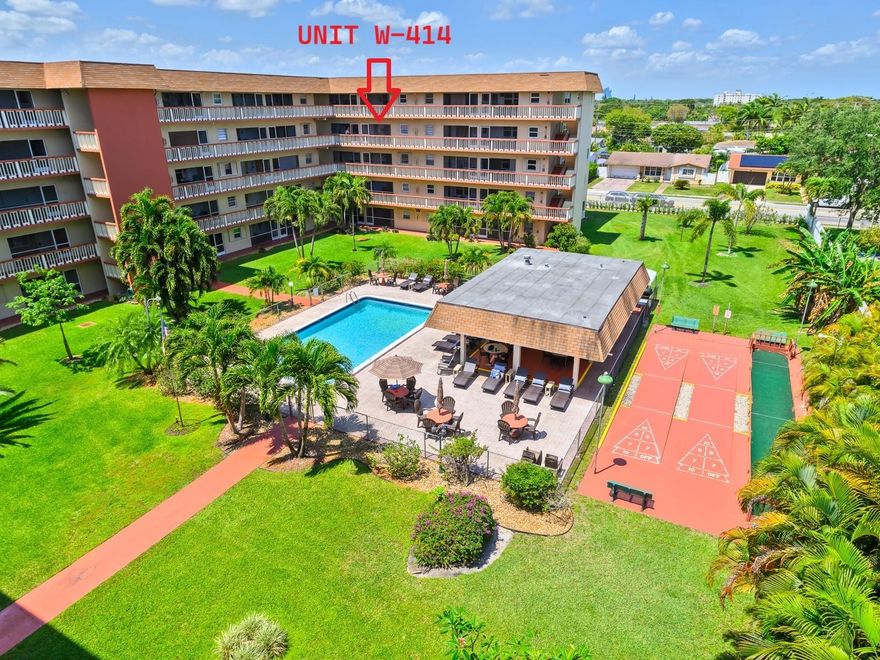 BEST CORPORATION IN BERVERLY HILLS COMMUNITY WITH OVER $366 000 IN RESERVE AND 50 YEARS COMPLETE! Move Right-in with NO WORRIES! Largest 2/2 with 1078 S.F  SOLD FURNISHED TURNKEY. Enjoy the view of the manicured lawn & pool area from your private porch! UPGRADED KITCHEN with breakfast bar & stools, extra cabinets & pantry, new appliances (2023) and updated countertop.  Ceramic tile throughout. NEW A/C (2023) & WATER HEATER (2026). Bright living / dining area well furnished. IMPACT MAIN DOOR & WINDOWS IN BOTH BEDROOMS. ALL pluming updated with new valves. Gorgeous BATHS remodeled. Both bedroom fully furnished with extra FREEZER in walkin.. Gated community secured with socials activities. OK to rent. 55+ BLDG. Amenities: clubhouse, billiard, gym, library, BBQ, pool, courtesy bus & more. FINANCIALLY BEST CORPORATION WITH $366 000 IN RESERVE AFTER THE 50 YEARS CERTIFICATION DONE!