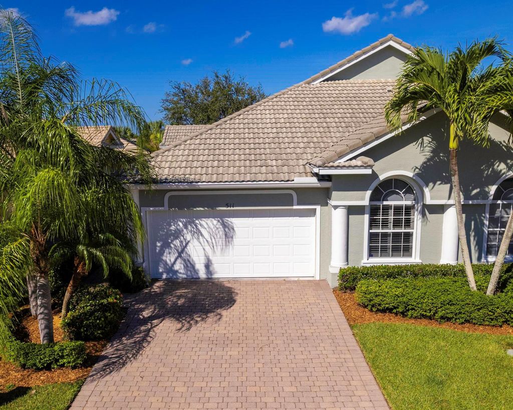 Photo of 511 NW Red Pine Way, Jensen Beach, FL 34957 (MLS # R10905569)