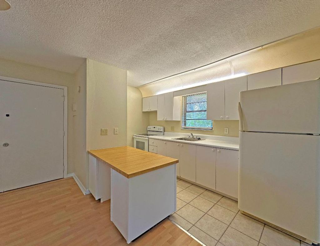 Photo of 1021 SE Monterey Road #A22, Stuart, FL 34994 (MLS # R11148786)