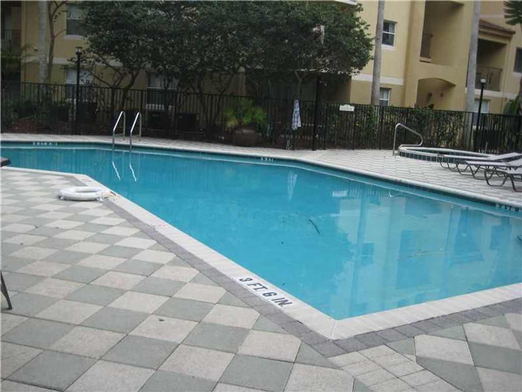 Photo of 741 N Pine Island Rd #214, Plantation, FL 33324 (MLS # F10537193)