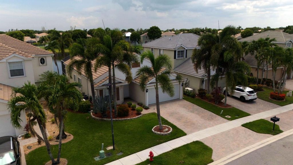 Photo of 110 Newberry Lane, Royal Palm Beach, FL 33414 (MLS # R11107079)