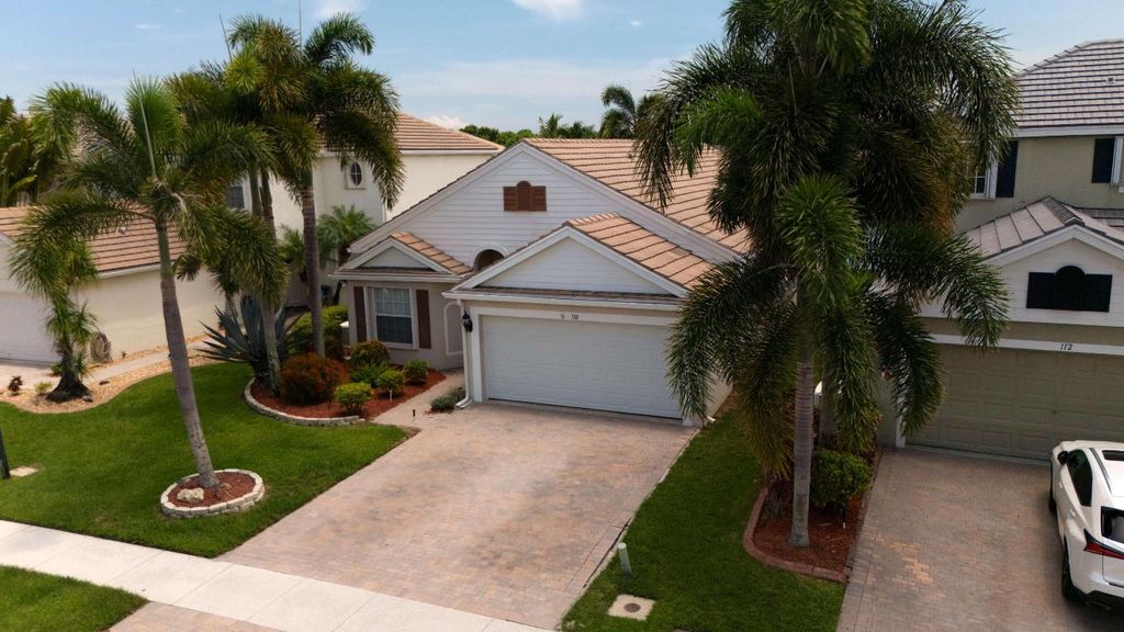 Photo of 110 Newberry Lane, Royal Palm Beach, FL 33414 (MLS # R11107079)