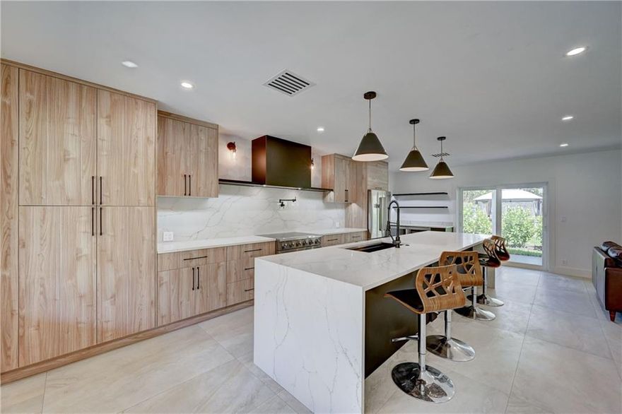 Large 2-Story, Corner Lot Home in the prime neighborhood OF CORAL HEIGHTS. The closest thing to NEW CONSTRUCTION. EVERYTHING is New Here $350,000 renovation!. Beautiful, Modern, Open-Concept, ideal for today's Living & Entertaining. Designer Kitchen. Spacious 1st floor/Lots of Natural Light, Covered Patio flows off the Living Room with 2 Beds/2 New Baths (Master Bedroom Up or Downstairs). Upstairs 2 Beds / 2 New Baths. Circular Driveway, Large Covered Front Porch, Fenced Yard, New Landscaping & Easy Access to add your Dream Pool. Additional features include: 1-Car Garage, New Roof / New A/C, Impact Windows & Door, Huge Separate Pantry & Laundry Room, Sprinklers on a Well, Updated Electric & Panels, ALL- NEW Plumbing & Sewer Lines! CAT6 Wiring. New Pool in the permit process, can customize $350,000.00+ RENOVATION JOB