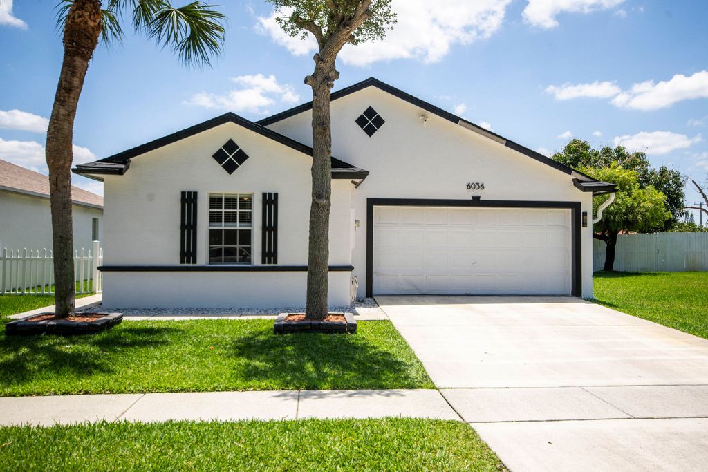 Photo of 6036 Azalea Circle, West Palm Beach, FL 33415 (MLS # B26025166)