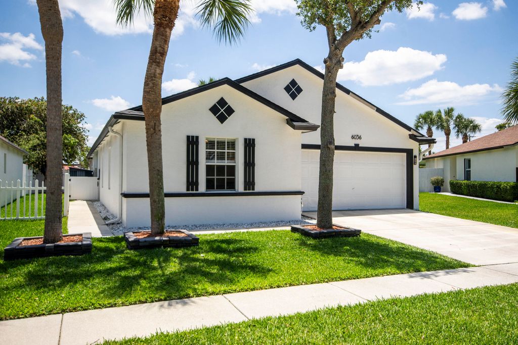 Photo of 6036 Azalea Circle, West Palm Beach, FL 33415 (MLS # B26025166)