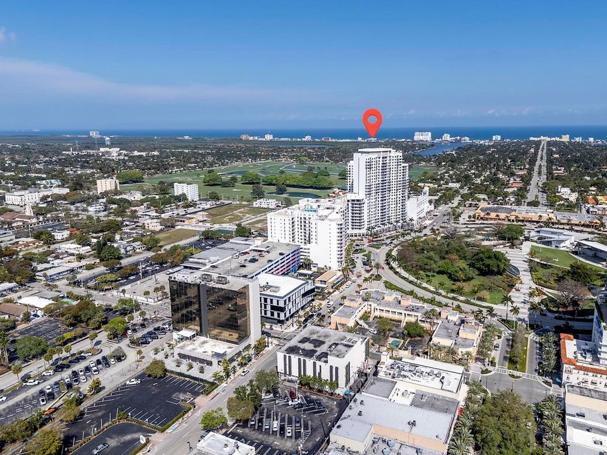 Fantastic 2BR/2BA condo featuring stunning views of Arts Park at Young Circle from the private balcony. This residence offers stainless steel appliances, granite countertops, oversized closets, and an in-unit washer and dryer. Pet-friendly building amenities include 24-hour security, valet parking, a state-of-the-art fitness center with saunas and treatment rooms, a rooftop pool and sundeck, two party rooms, and a business center. Ground-level retail and commercial shops add to the convenience and lifestyle appeal. Ideally located within walking distance to Downtown Hollywood shopping, dining, and entertainment, and just minutes from Hollywood Beach, Aventura, and Fort Lauderdale.
