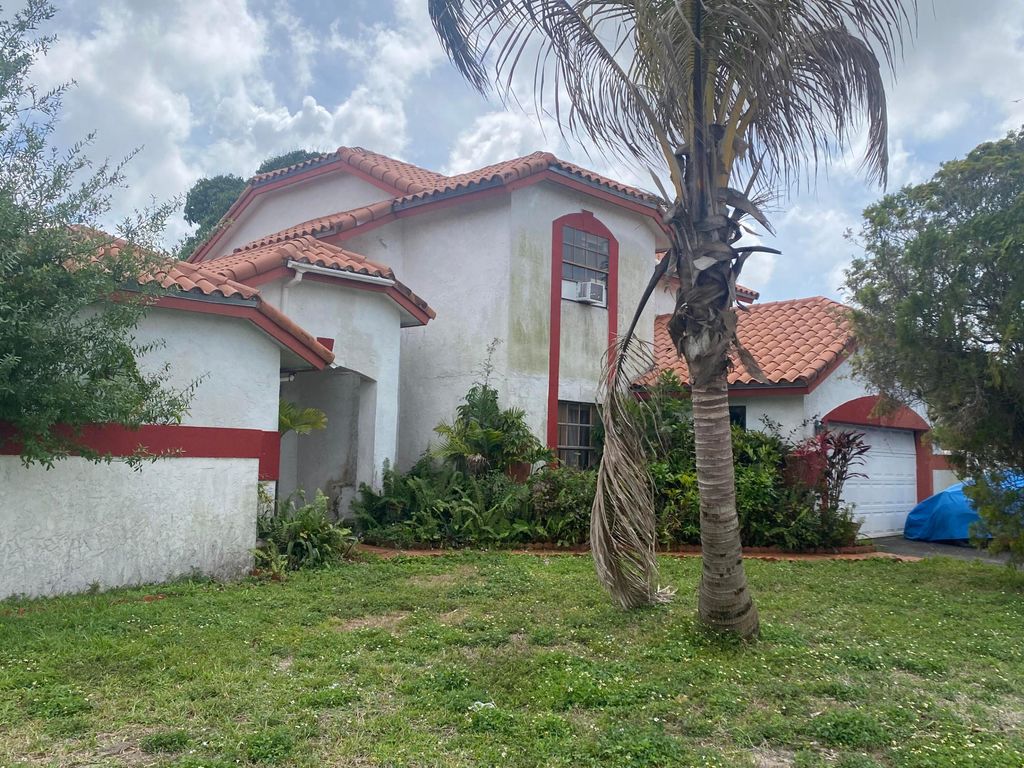 Photo of 7350 NW 54th Court, Lauderhill, FL 33319 (MLS # B26011211)