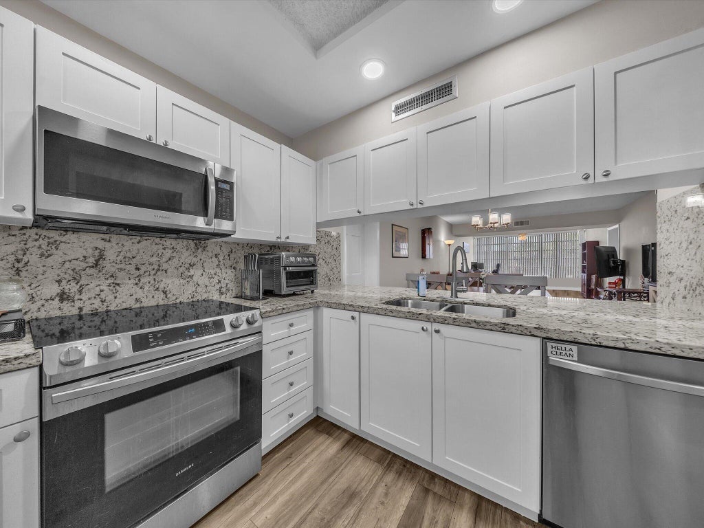Photo of 1701 Whitehall Drive #302, Davie, FL 33324 (MLS # B26073323)