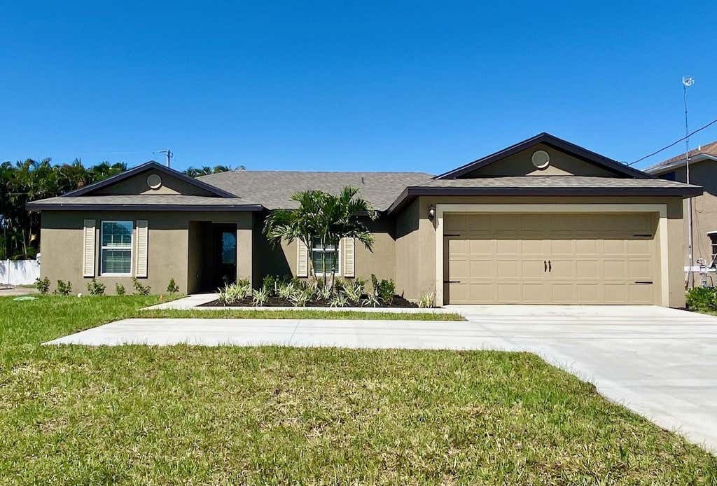 Photo of 1926 SW Davis Street, Port Saint Lucie, FL 34953 (MLS # F10427858)