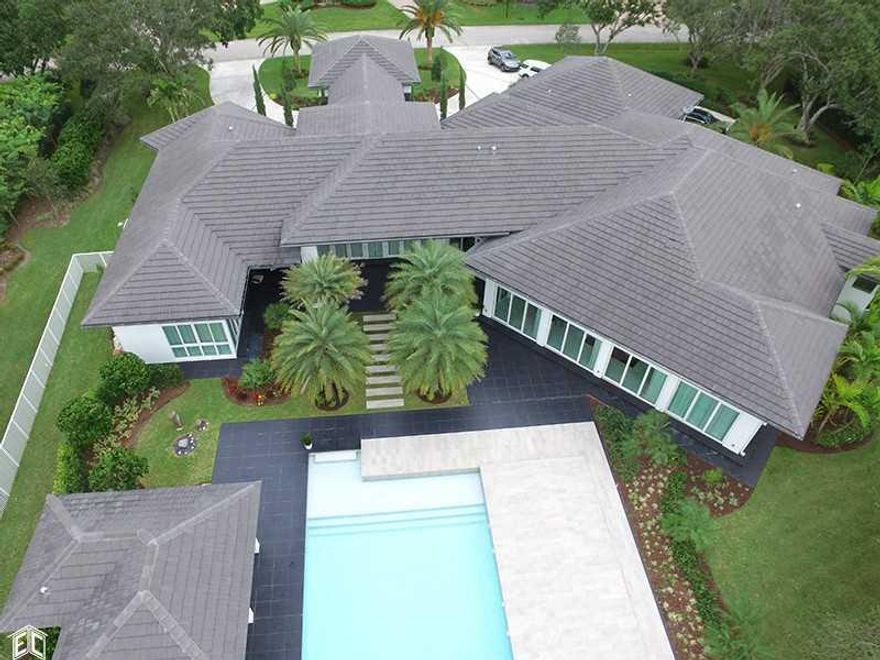 GOURGEOUS HIGH END CONTRUCTION, MANY DETAILS TO COUNT, GATED COMMUNITY  WINDMILL RANCH ESTATES.  THIS HOME FEATURES TOP OF LINE APPLIANCES, FINISHES THROUGHOUT,  A GOURMET  EAT-IN KITCHEN, PANORAMIC VIEWS, ALL IMPACT WINDOWS, TWO  SPACIOUS FAMILY ROOMS,   GREAT FLORIDA ROOM, FORMAL LIVING AND DINING ROOM, 5 SPACIOUS BEDROOMS, 6 FULL BATHROOMS, 2 HALF BATHROOMS, PLAY ROOM, OFFICE,SMART HOME EQUIPED WITH A SYSTEM THAT CONTROLS LIGHTING, ALARM, A/C,SPECTACULAR  BACKYARD WITH LAKE VIEWS, CABANA POOL & SPA