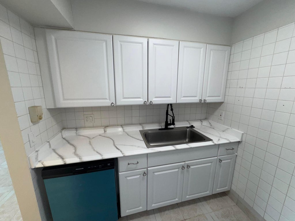 Photo of 1758 Abbey Road #102, West Palm Beach, FL 33415 (MLS # B26078819)