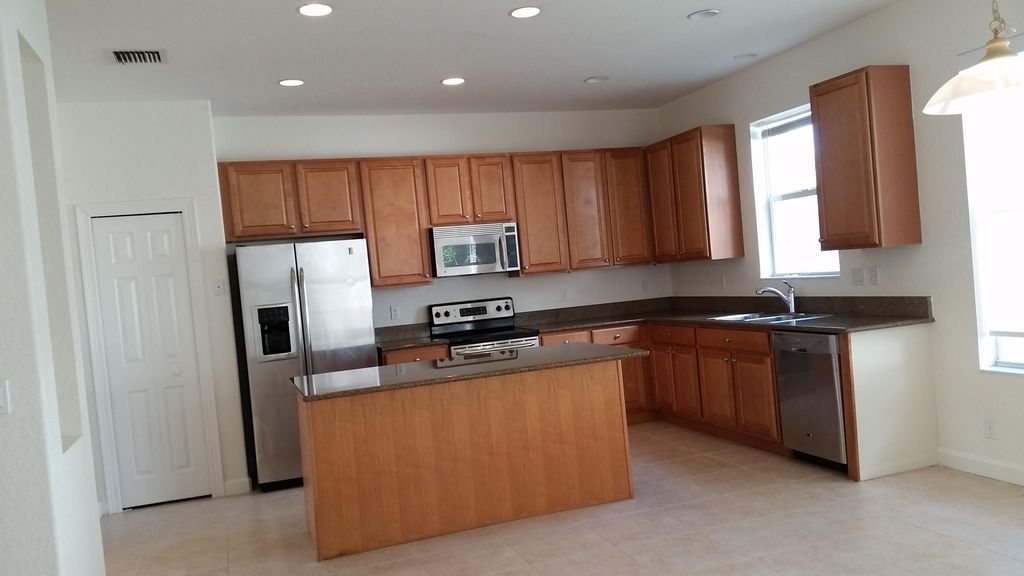 Photo of 8211 Calterra Drive, Palm Beach Gardens, FL 33418 (MLS # R10841736)