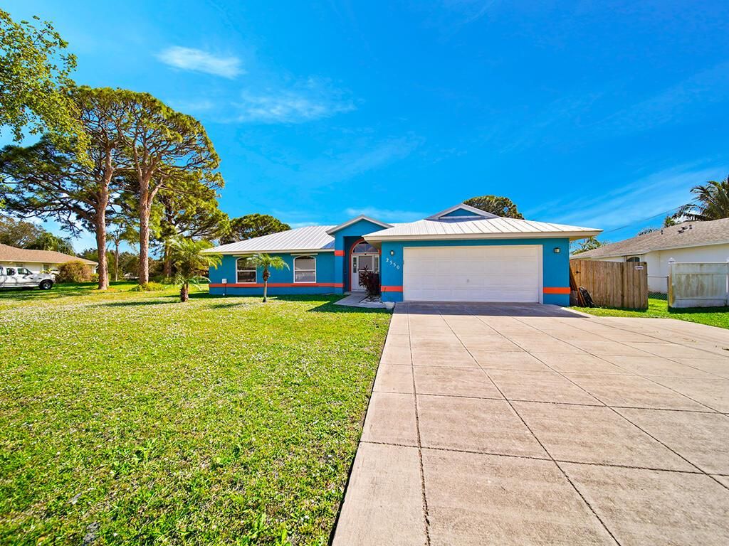 Photo of 2550 SE Grand Drive, Port Saint Lucie, FL 34952 (MLS # R11061278)