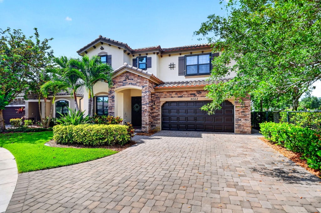 Photo of 9062 Gulf Cove Drive, Wellington, FL 33467 (MLS # B26028450)