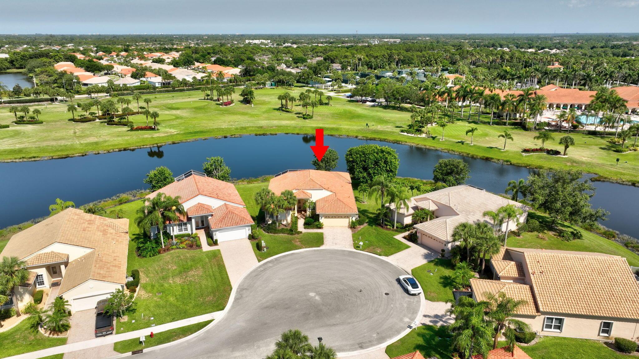 UNOBSTRUCTED WATER VIEWS! Best homesite in the Community. Experience the epitome of luxury and peaceful tranquility in this FULLY RENOVATED Merlot model, perfectly positioned to capture rare unmatched Privacy. Enjoy your morning coffee overlooking the lake and tropical Florida birds. Nestled on a quiet cul-de-sac, with no rear neighbors, this serene retreat boasts over $100K in upgrades: Saturnia marble floors, New Kitchen with Granite counters & 42'' white cabinetry, Stainless Appliances, Elegantly Renovated Bathrooms, Custom Window Treatments and wall finishes, New moldings, Water softener, and Fresh Interior/Exterior Paint. Enjoy the EXTENDED Re-screened Lanai with Barbeque and the calming ambiance of this truly exceptional home.