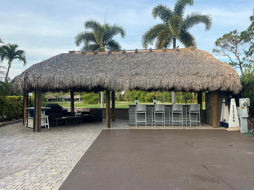 Beautiful lot in Motor Coach Resort Luxury Park , This lot is newly updated with bar granite counter top, sink , fridge and plenty of storage , large newly built tiki, beautiful landscaping to enjoy backs to a golf course private lot , plenty of room to entertain , newly added pavers with a design . Large lot .Close to dog park pool and laundry facilities. Come and enjoy 4 pools , 4 hot tubs, golf course 18 hole Par 3 executive course . Pickle ball, bocce ball , tennis , shuffleboard , darts , library, clubhouse , billiards, library , gym etc etc ! Happy Hour on Friday night during season. Very active community.