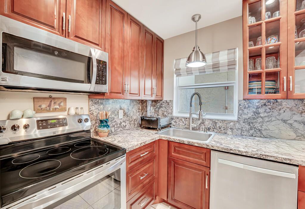 SNUG HARBOR GARDENS CONDO - Residential