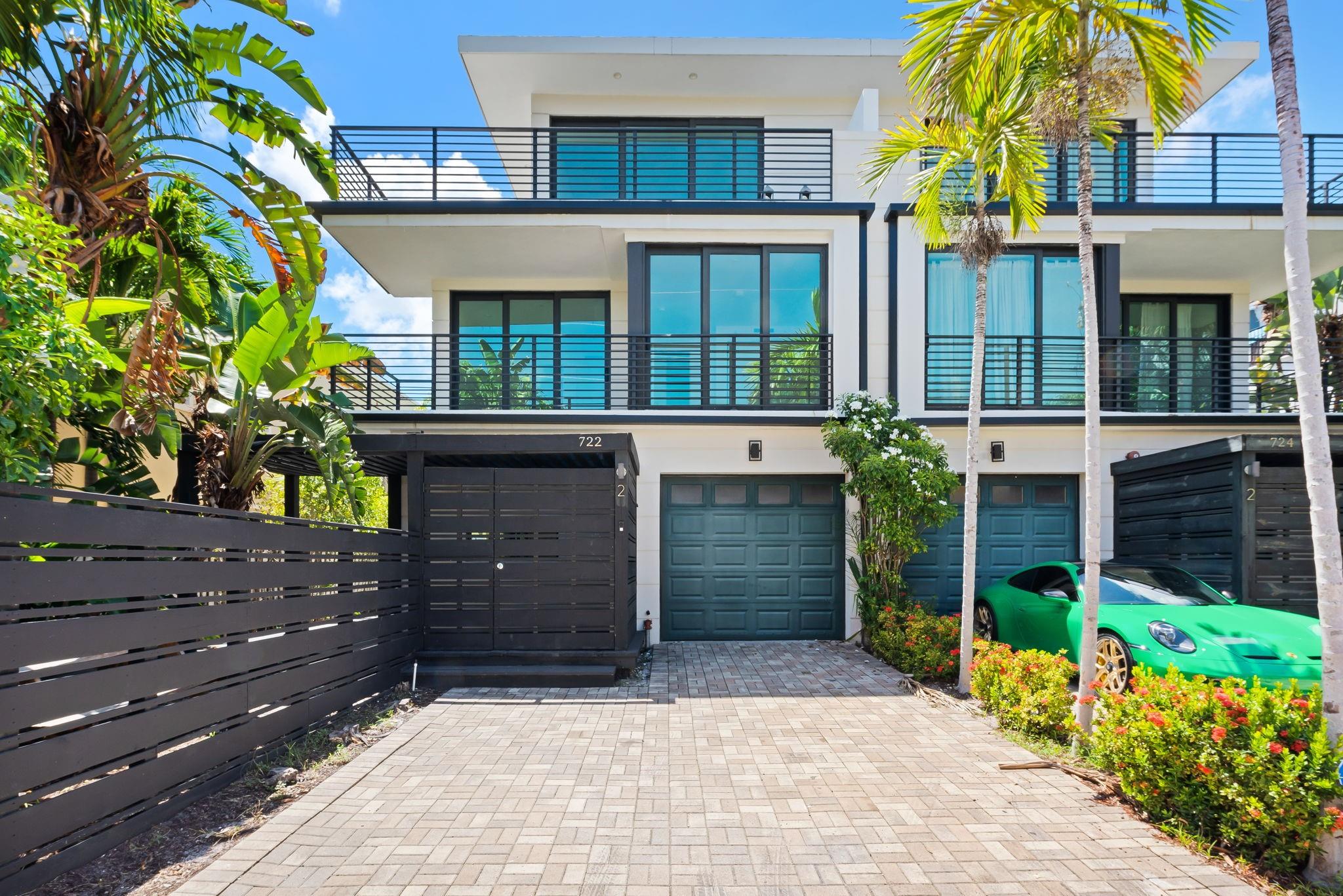 Modern architecture meets effortless functionality in the sought-after neighborhood of Victoria Park. Built in 2019, this 4-bedroom townhome is filled with natural light and designed for today’s lifestyle. A seamless floor plan features sleek sliding closet doors, while luxury finishes include Italkraft designer kitchens and baths.
Enjoy the privacy of your own one-car garage and the beauty of floor-to-ceiling glass sliders in both the master suite and main living area—opening to exceptional outdoor spaces including a wooden deck with a dark-wood gazebo and a wraparound balcony. Just minutes from Las Olas, Galleria Mall, the beach, the airport, and all of downtown Fort Lauderdale. Ideal for first-time homebuyers or investors seeking style, location, and quality in one package.