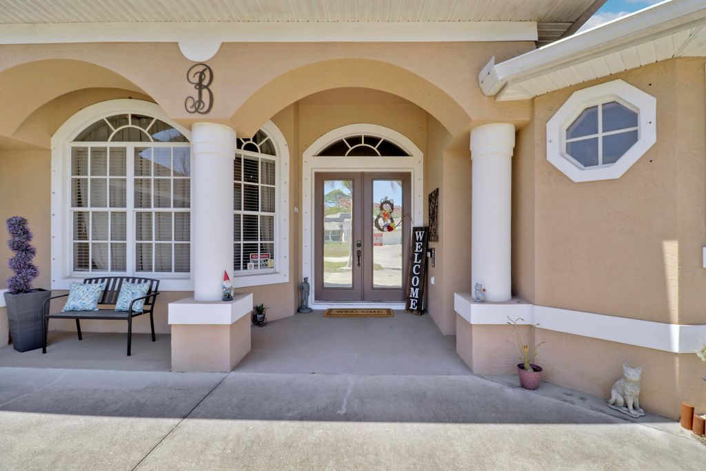 Photo of 1902 SW Americana St, Port Saint Lucie, FL 34953 (MLS # B26001113)