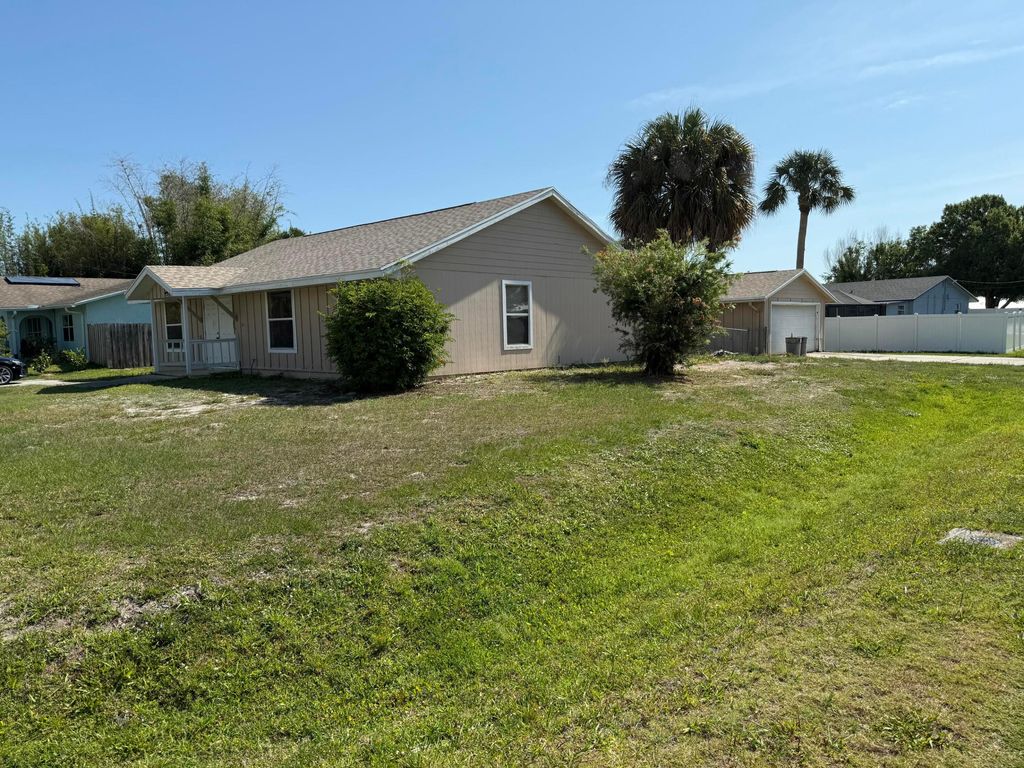 Photo of 5014 Palm Drive, Fort Pierce, FL 34982 (MLS # B26014878)