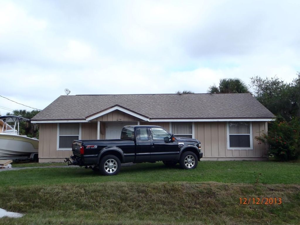 Photo of 5014 Palm Drive, Fort Pierce, FL 34982 (MLS # B26014878)