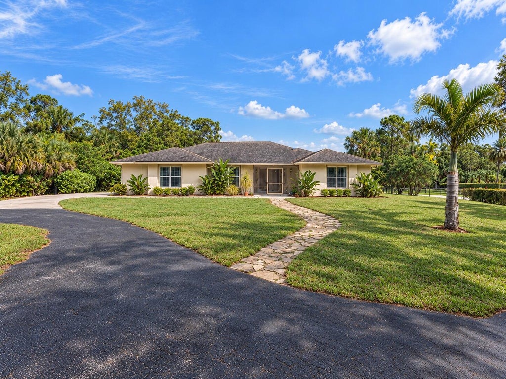 Photo of 4535 123rd Trail N, West Palm Beach, FL 33411 (MLS # B26090294)