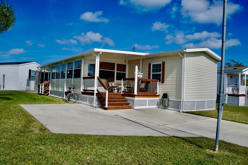 Photo of 114 Sandhill Boulevard, Fort Pierce, FL 34982 (MLS # R11057942)
