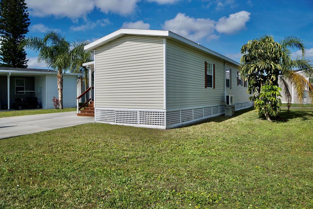 Photo of 114 Sandhill Boulevard, Fort Pierce, FL 34982 (MLS # R11057942)