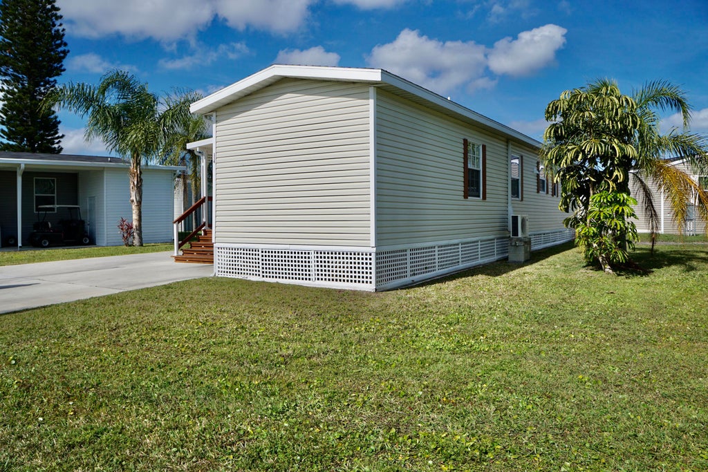 Photo of 114 Sandhill Boulevard, Fort Pierce, FL 34982 (MLS # R11057942)