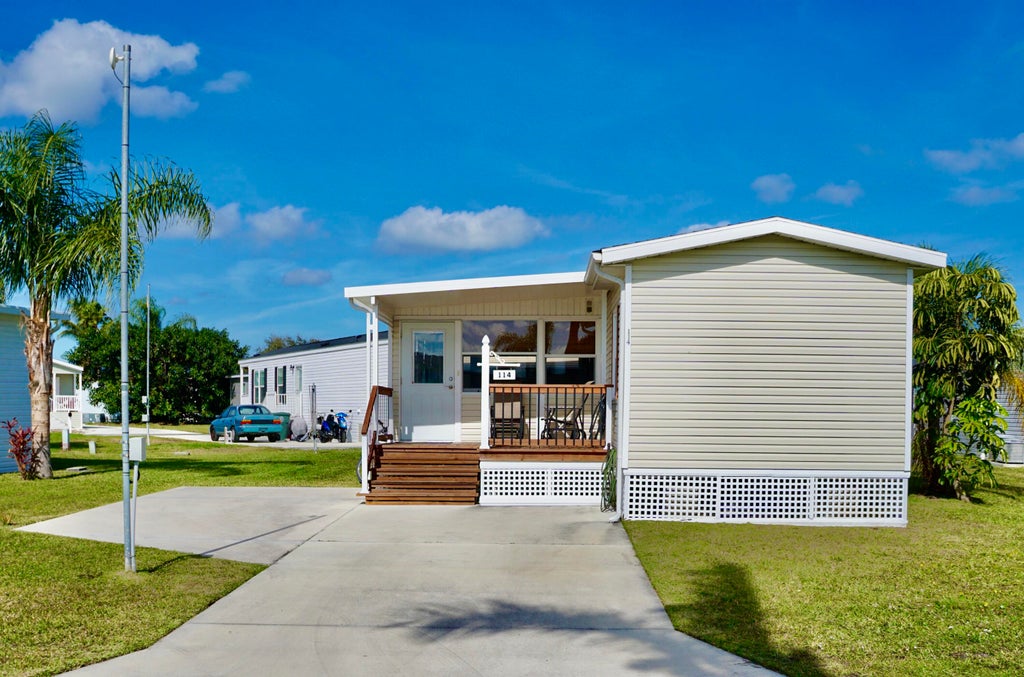 Photo of 114 Sandhill Boulevard, Fort Pierce, FL 34982 (MLS # R11057942)